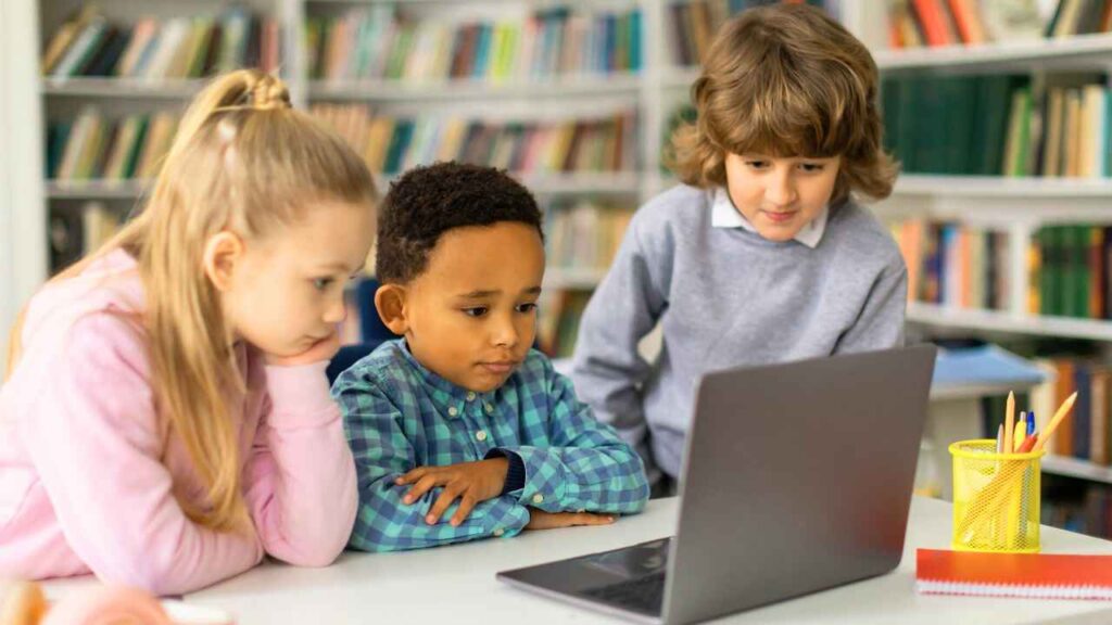 Kids learning and watching at school in laptop screen